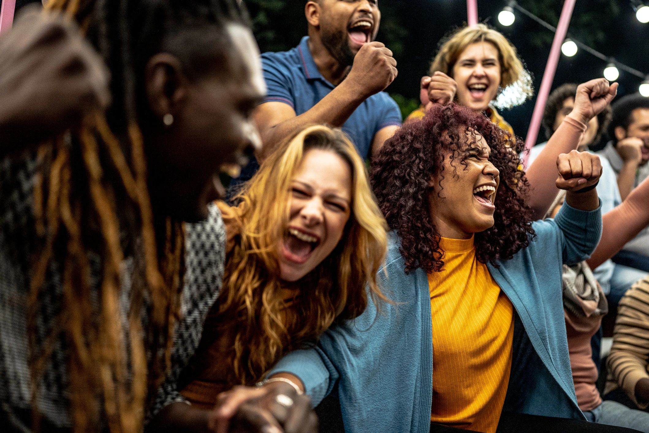 Friends celebrating together during a game